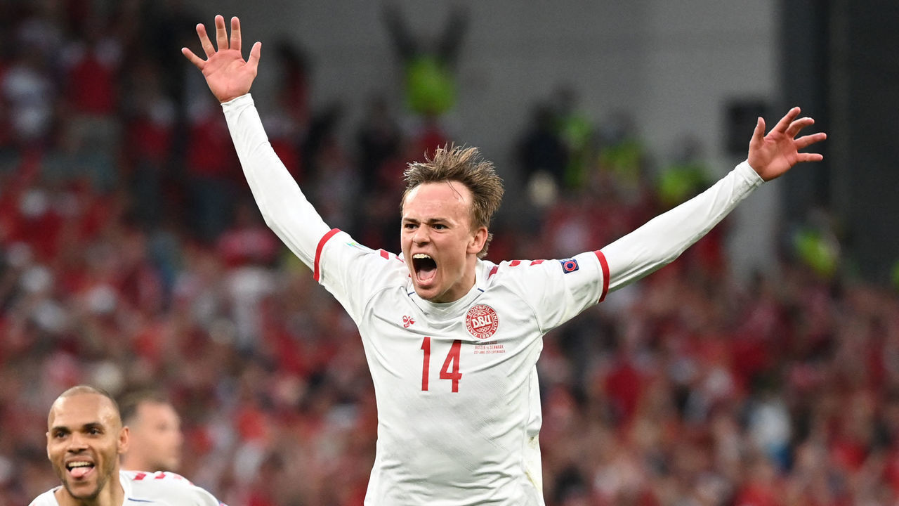 TOPSHOT - Denmark's forward Mikkel Damsgaard celebrates after scoring his team's first goal during the UEFA EURO 2020 Group B football match between Russia and Denmark at Parken Stadium in Copenhagen on June 21, 2021.
