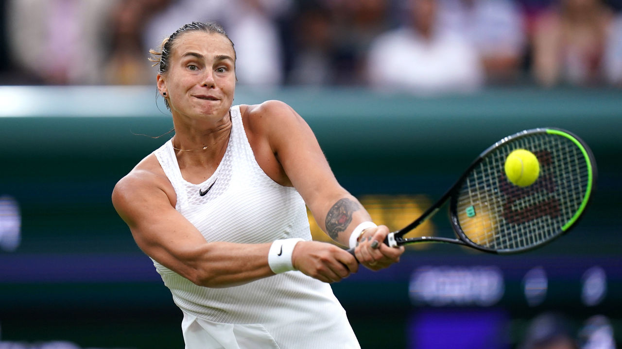 Aryna Sabalenka in action during her Ladies' singles match against Ons Jabeur on day eight of Wimbledon at The All England Lawn Tennis and Croquet Club, Wimbledon. Picture date: Tuesday July 6, 2021.