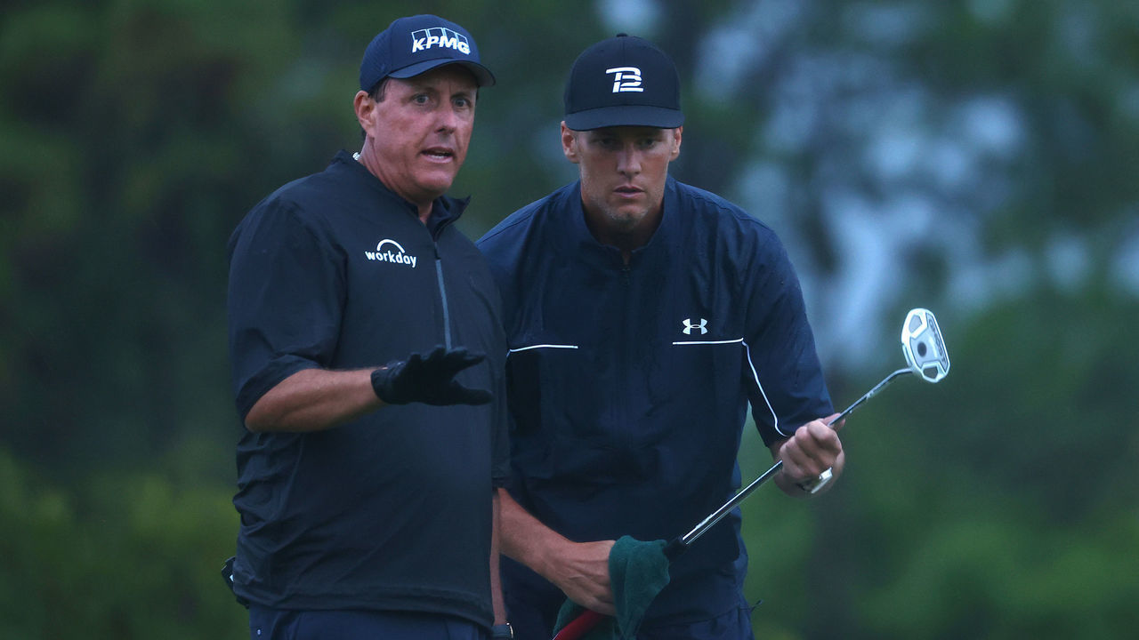 HOBE SOUND, FLORIDA - MAY 24: Phil Mickelson reads a putt for NFL player Tom Brady of the Tampa Bay Buccaneers on the 17th green during The Match: Champions For Charity at Medalist Golf Club on May 24, 2020 in Hobe Sound, Florida.