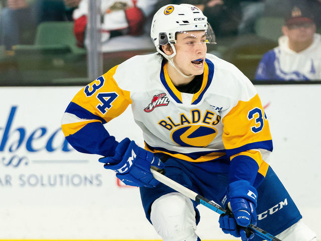 EVERETT, WASHINGTON - NOVEMBER 22: Saskatoon Blades forward Colton Dach #34 waits for a pass at the blue line during the third period of a game between the Everett Silvertips and the Saskatoon Blades at Angel of the Winds Arena on November 22, 2019 in Everett, Washington.
