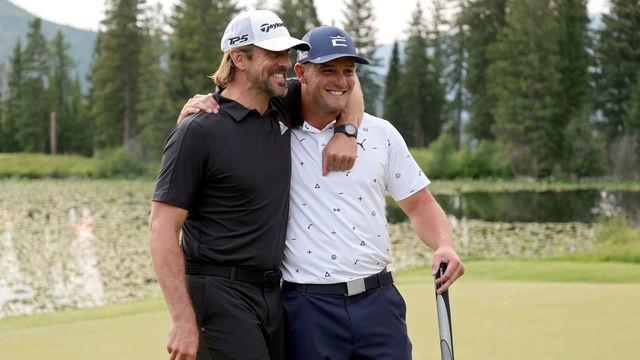 BIG SKY, MONTANA - JULY 06: Aaron Rodgers (L) and Bryson DeChambeau celebrate after winning Capital One's The Match at The Reserve at Moonlight Basin on July 06, 2021 in Big Sky, Montana.