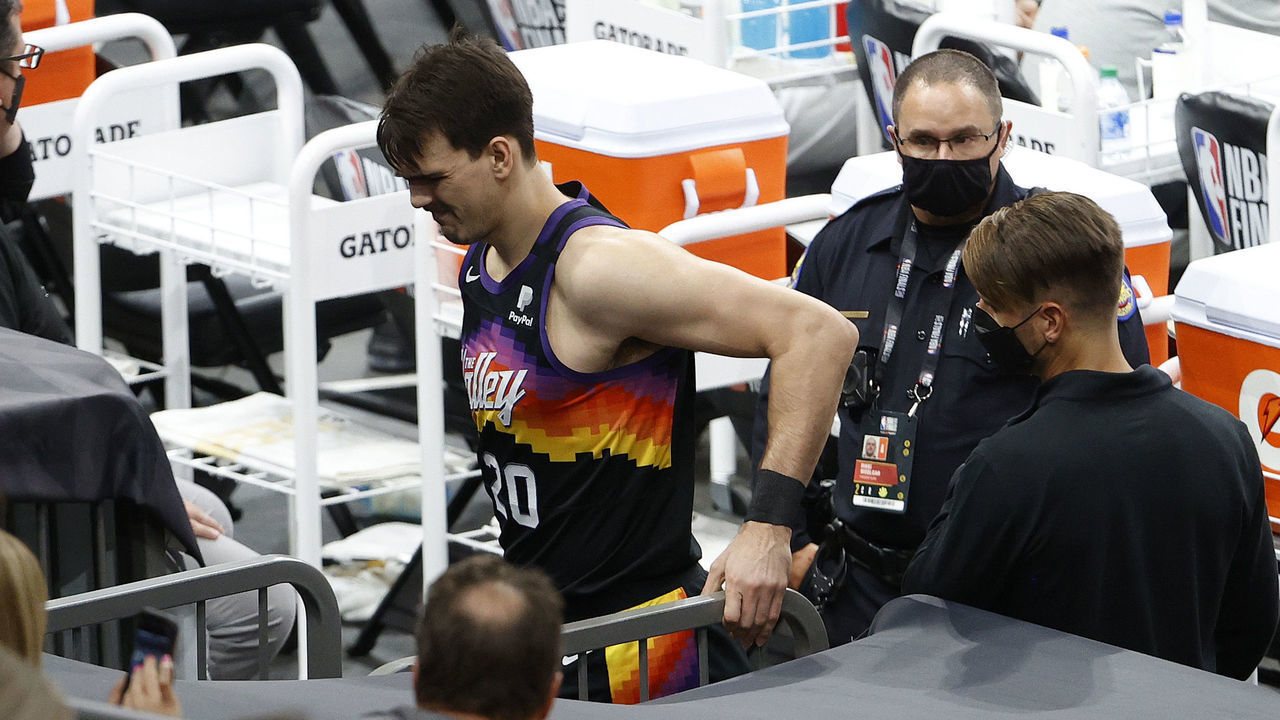 PHOENIX, ARIZONA - JULY 06: Dario Saric #20 of the Phoenix Suns leaves the court during the first half in Game One of the NBA Finals against the Milwaukee Bucks at Phoenix Suns Arena on July 06, 2021 in Phoenix, Arizona.