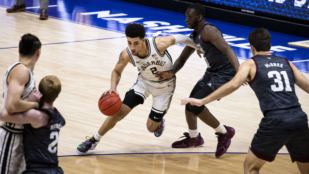 NASHVILLE, TN - MARCH 10: Scotty Pippen Jr. #2 of the Vanderbilt Commodores drives to the basket against the Texas A&M Aggies during the second half at Bridgestone Arena on March 10, 2021 in Nashville, Tennessee.