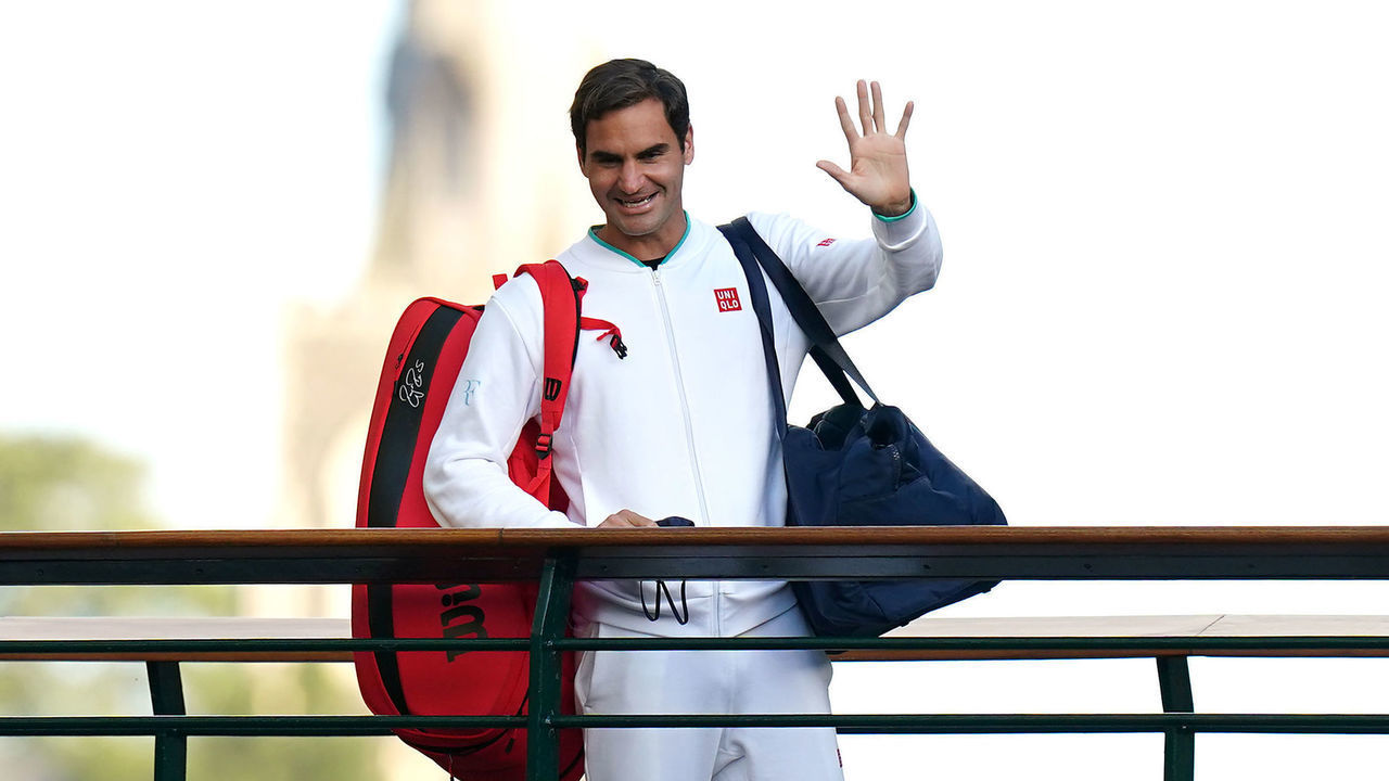 Roger Federer waves to the spectators as he walks over the bridge on day nine of Wimbledon at The All England Lawn Tennis and Croquet Club, Wimbledon. Picture date: Wednesday July 7, 2021.