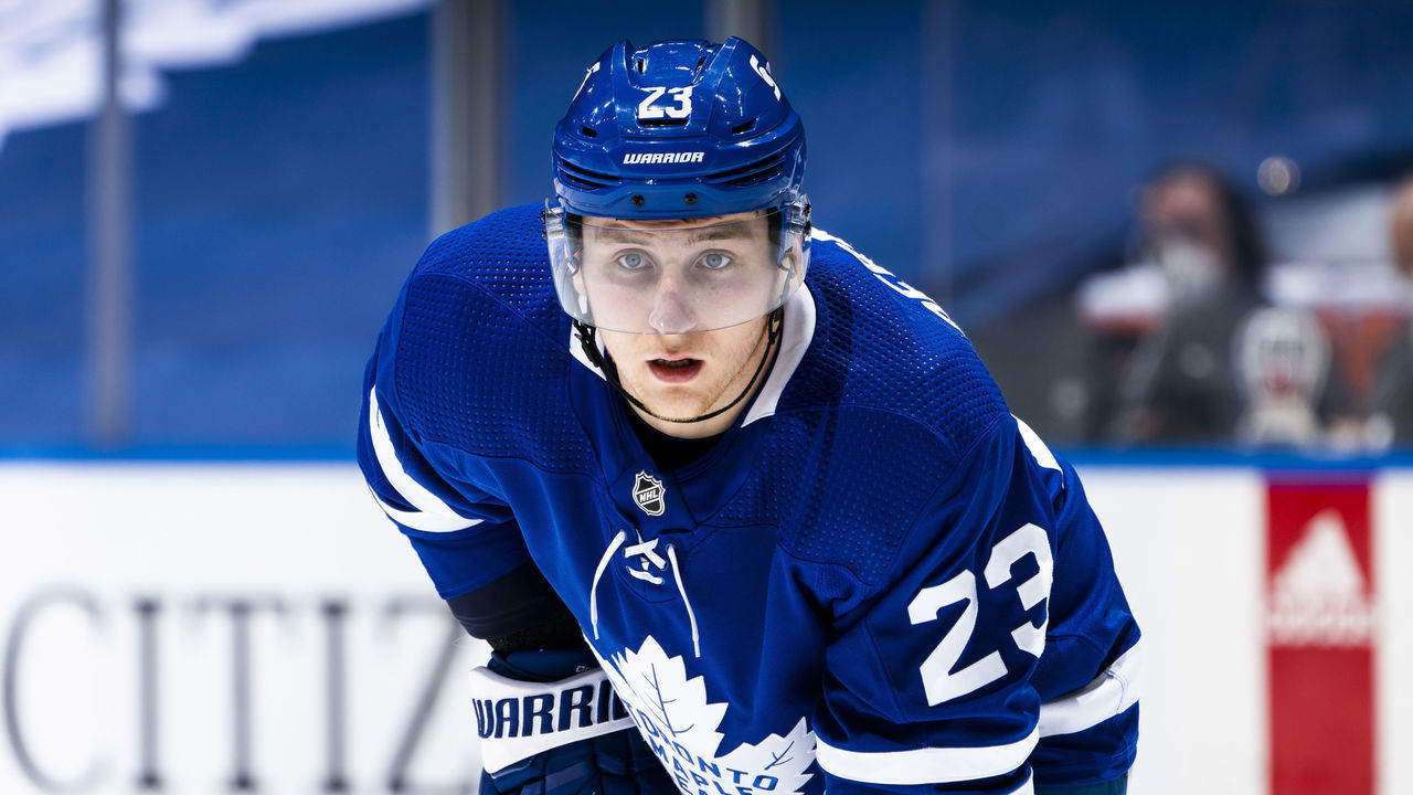 TORONTO, ON - APRIL 29: Travis Dermott #23 of the Toronto Maple Leafs looks on against the Vancouver Canucks during the third period at the Scotiabank Arena on April 29, 2021 in Toronto, Ontario, Canada.