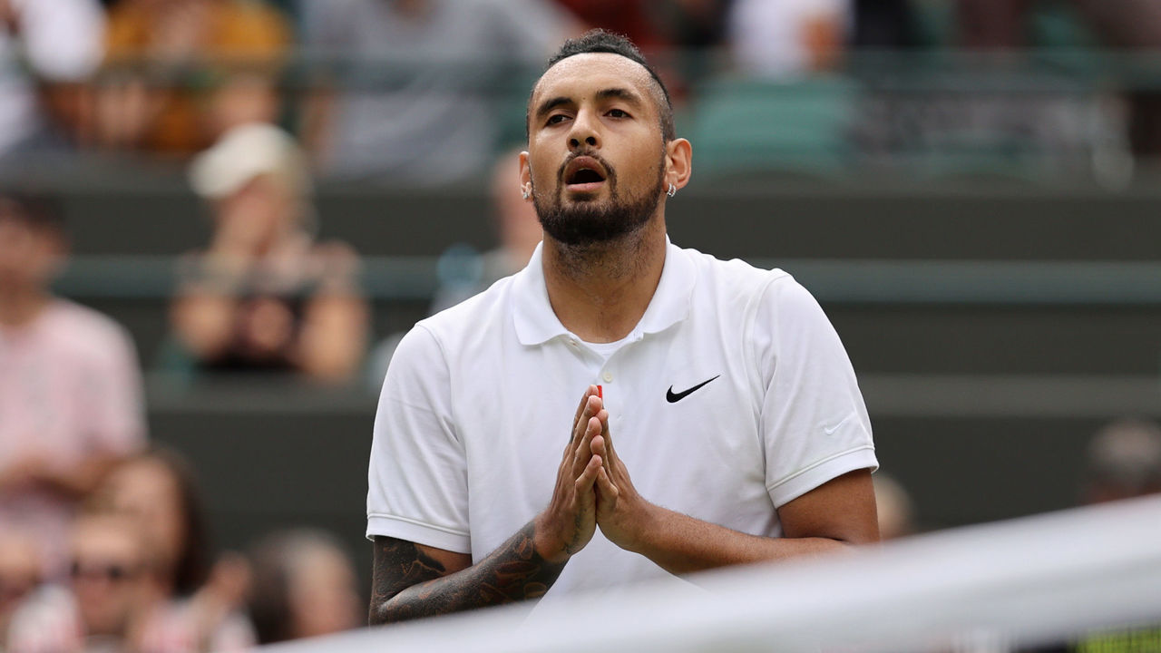 LONDON, ENGLAND - JULY 03: Nick Kyrgios of Australia interacts with the crowd after retiring injured during his men's singles third round match against Felix Auger Aliassime of Canada during Day Six of The Championships - Wimbledon 2021 at All England Lawn Tennis and Croquet Club on July 03, 2021 in London, England.