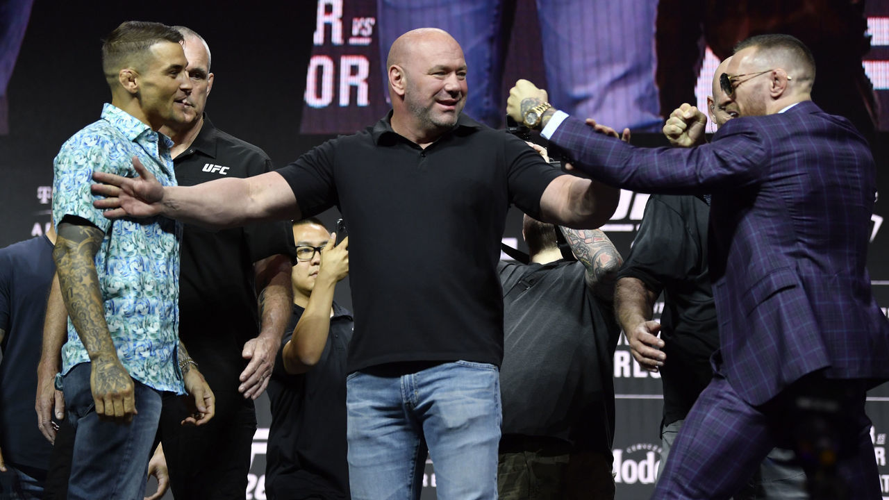LAS VEGAS, NEVADA - JULY 08: (L-R) Opponents Dustin Poirier and Conor McGregor of Ireland face off during the UFC 264 press conference at T-Mobile Arena on July 08, 2021 in Las Vegas, Nevada.