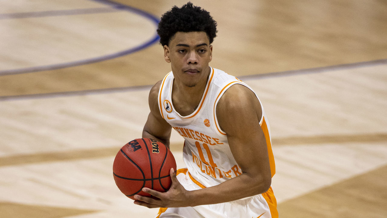 NASHVILLE, TN - MARCH 12: Jaden Springer #11 of the Tennessee Volunteers dribbles up court against the Florida Gators during the first half of their quarterfinal game in the SEC Men's Basketball Tournament at Bridgestone Arena on March 12, 2021 in Nashville, Tennessee.