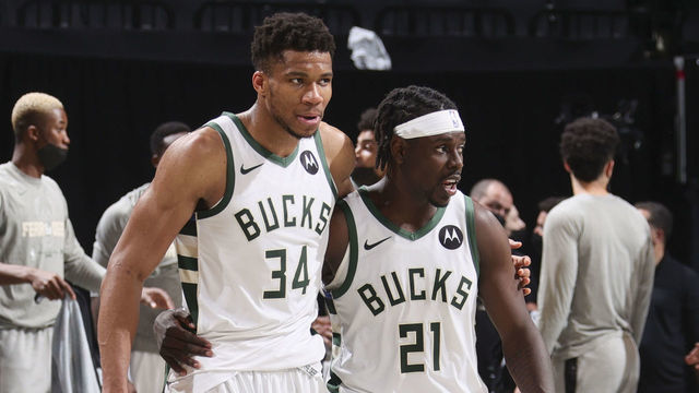 BROOKLYN, NY - JUNE 19: Giannis Antetokounmpo #34 of the Milwaukee Bucks hugs Jrue Holiday #21 of the Milwaukee Bucks after the game against the Brooklyn Nets during Round 2, Game 7 of the 2021 NBA Playoffs on June 19, 2021 at Barclays Center in Brooklyn, New York. Mandatory Copyright Notice: Copyright 2021 NBAE
