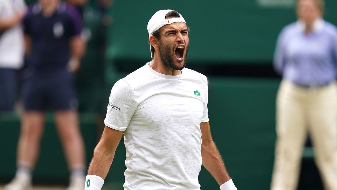 Matteo Berrettini celebrates victory against Hubert Hurkacz in the mens singles semi final match on day eleven of Wimbledon at The All England Lawn Tennis and Croquet Club, Wimbledon. Picture date: Friday July 9, 2021.