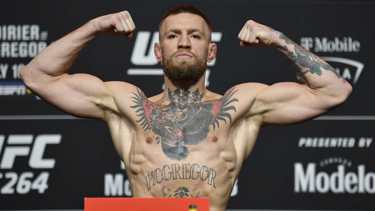 LAS VEGAS, NEVADA - JULY 09: Conor McGregor of Ireland poses on the scale during the UFC 264 official weigh-in at UFC APEX on July 09, 2021 in Las Vegas, Nevada.