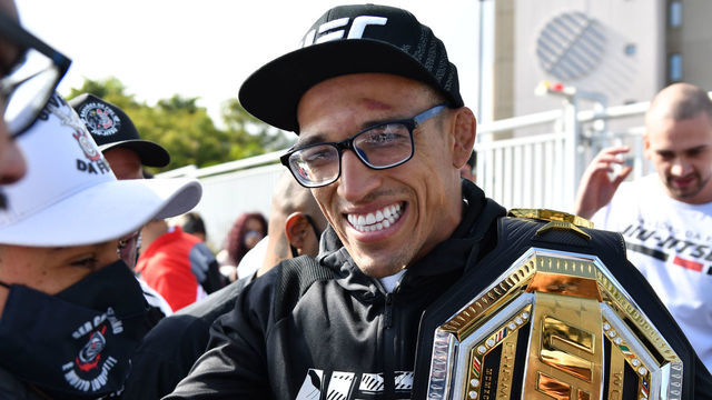 SAO PAULO, BRAZIL - MAY 17: Fans cheer as the MMA fighter Charles Oliveira arrives at Sao Paulos International Airport on May 17, 2021 in Guarulhos, Sao Paulo, Brazil. The Brazilian is the new UFC Lightweight Champion after beating Michael Chandler in the UFC 262.