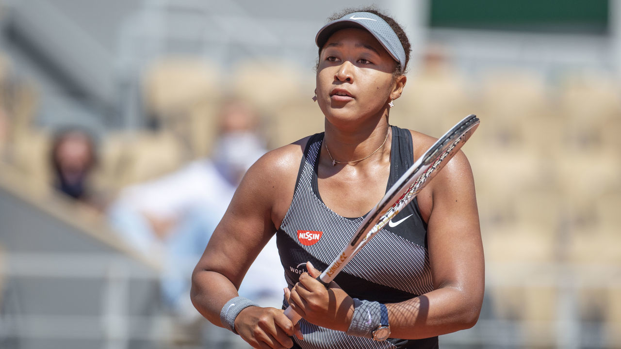 PARIS, FRANCE May 30. Naomi Osaka of Japan during her match against Patricia Maria Tig of Romania in the first round of the Women's Singles competition on Court Philippe-Chatrier at the 2021 French Open Tennis Tournament at Roland Garros on May 30th 2021 in Paris, France.