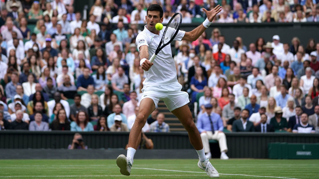 Novak Djokovic in action against Denis Shapovalov in the semi final match on centre court on day eleven of Wimbledon at The All England Lawn Tennis and Croquet Club, Wimbledon. Picture date: Friday July 9, 2021.