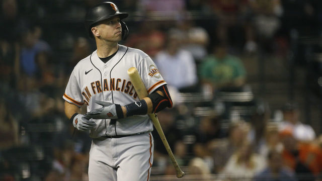 PHOENIX, ARIZONA - JULY 01: Buster Posey #28 of the San Francisco Giants looks back toward the mound after being called out on strikes against the Arizona Diamondbacks during the eighth inning of the MLB game at Chase Field on July 01, 2021 in Phoenix, Arizona.