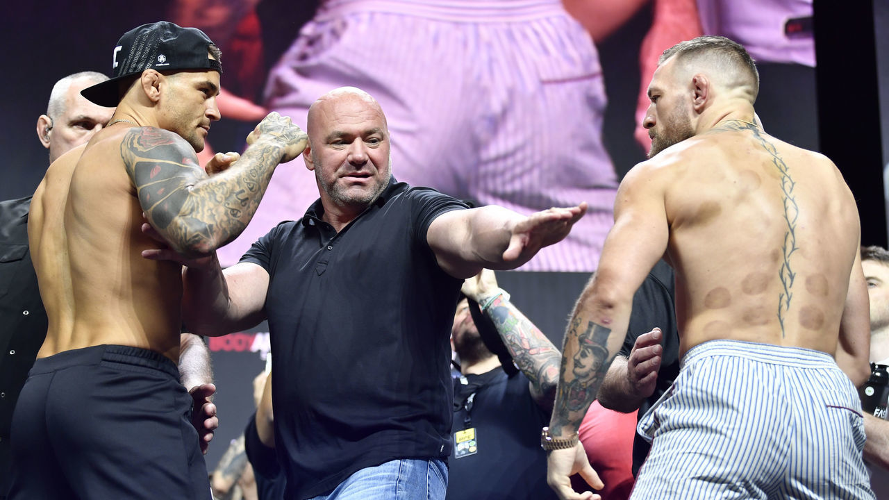 LAS VEGAS, NEVADA - JULY 09: (L-R) Opponents Dustin Poirier and Conor McGregor of Ireland face off during the UFC 264 ceremonial weigh-in at T-Mobile Arena on July 09, 2021 in Las Vegas, Nevada.