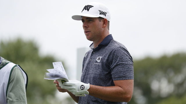 SILVIS, IL - JULY 09: PGA golfer Luke List looks at his yardage book on the 7th tee during the John Deere Classic on July 9, 2021 at TPC Deere Run in Silvis, Illinois.
