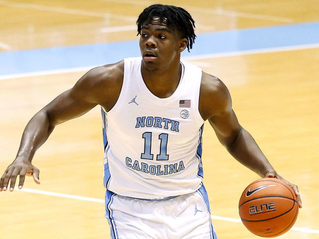 CHAPEL HILL, NORTH CAROLINA - FEBRUARY 17: Day'Ron Sharpe #11 of the North Carolina Tar Heels moves the ball against the Northeastern Huskies during their game at the Dean Smith Center on February 17, 2021 in Chapel Hill, North Carolina. North Carolina won 82-62.