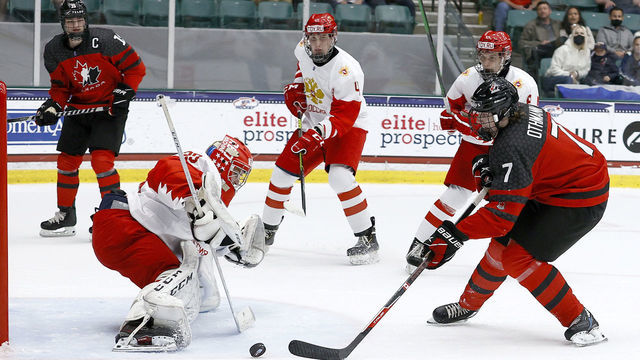 FRISCO, TEXAS - MAY 06: Brennan Othmann #7 of Canada puts a shot on goal against Sergei Ivanov #29 of Russia in the first period during the 2021 IIHF Ice Hockey U18 World Championship Gold Medal Game at Comerica Center on May 06, 2021 in Frisco, Texas.