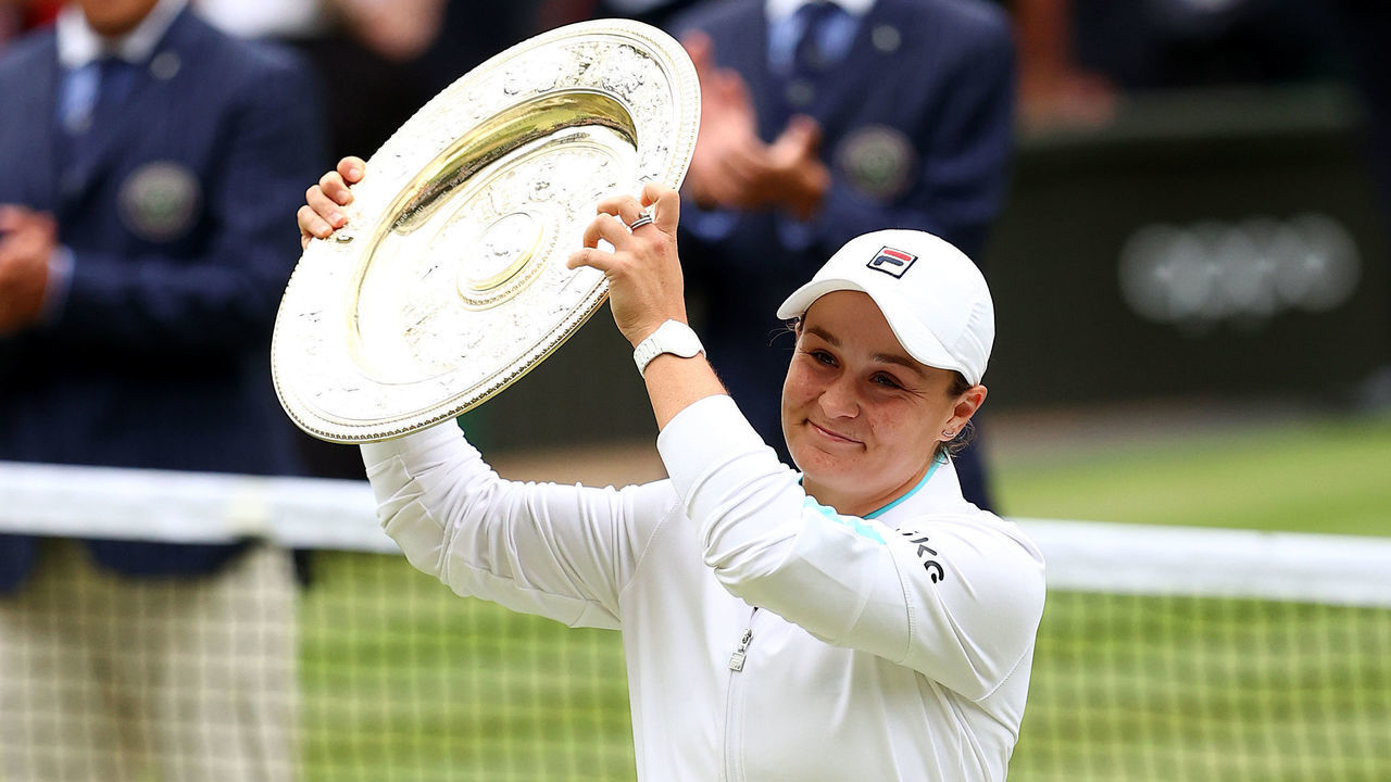 LONDON, ENGLAND - JULY 10: Ashleigh Barty of Australia celebrates with the Venus Rosewater Dish trophy after winning her Ladies' Singles Final match against Karolina Pliskova of The Czech Republic on Day Twelve of The Championships - Wimbledon 2021 at All England Lawn Tennis and Croquet Club on July 10, 2021 in London, England.