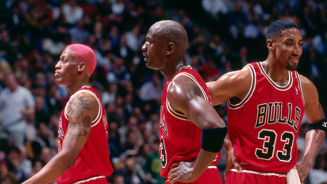 EAST RUTHERFORD, NJ - APRIL 11: Dennis Rodman #91, Michael Jordan #23, and Scottie Pippen #33 of the Chicago Bulls during the game against the New Jersey Nets on April 11, 1996 at Brendan Byrne Arena in East Rutherford, New Jersey. NOTE TO USER: User expressly acknowledges and agrees that, by downloading and/or using this photograph, user is consenting to the terms and conditions of the Getty Images License Agreement. Mandatory Copyright Notice: Copyright 1996 NBAE