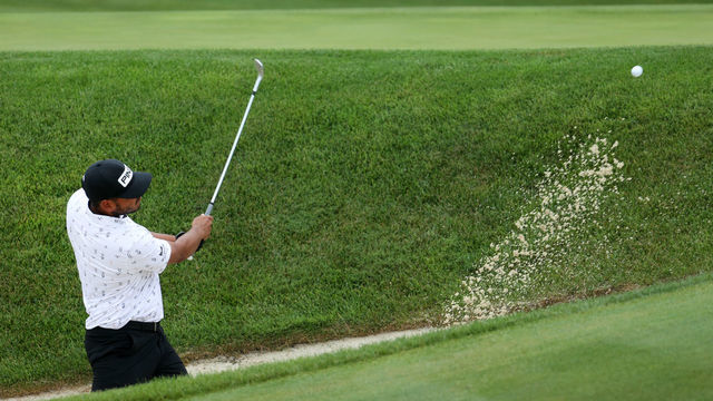 SILVIS, ILLINOIS - JULY 10: Sebastian Munoz of Colombia plays a shot from a bunker on the 16th hole during the third round of the John Deere Classic at TPC Deere Run on July 10, 2021 in Silvis, Illinois.