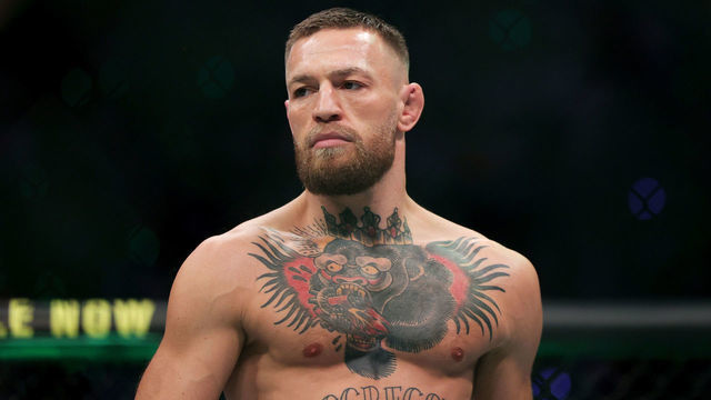 LAS VEGAS, NEVADA - JULY 10: Conor McGregor of Ireland walks in the octagon before his lightweight bought against :Dustin Poirier during UFC 264: Poirier v McGregor 3 at T-Mobile Arena on July 10, 2021 in Las Vegas, Nevada.