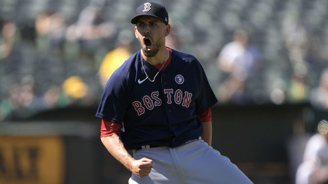 OAKLAND, CALIFORNIA - JULY 04: Matt Barnes #32 of the Boston Red Sox reacts after striking out Seth Brown #15 of the Oakland Athletics to end the game at RingCentral Coliseum on July 04, 2021 in Oakland, California. The Red Sox won the game 1-0.