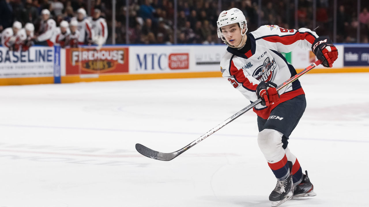 OSHAWA, ON - FEBRUARY 23: Wyatt Johnston #55 of the Windsor Spitfires passes the puck during an OHL game against the Oshawa Generals at the Tribute Communities Centre on February 23, 2020 in Oshawa, Ontario, Canada.