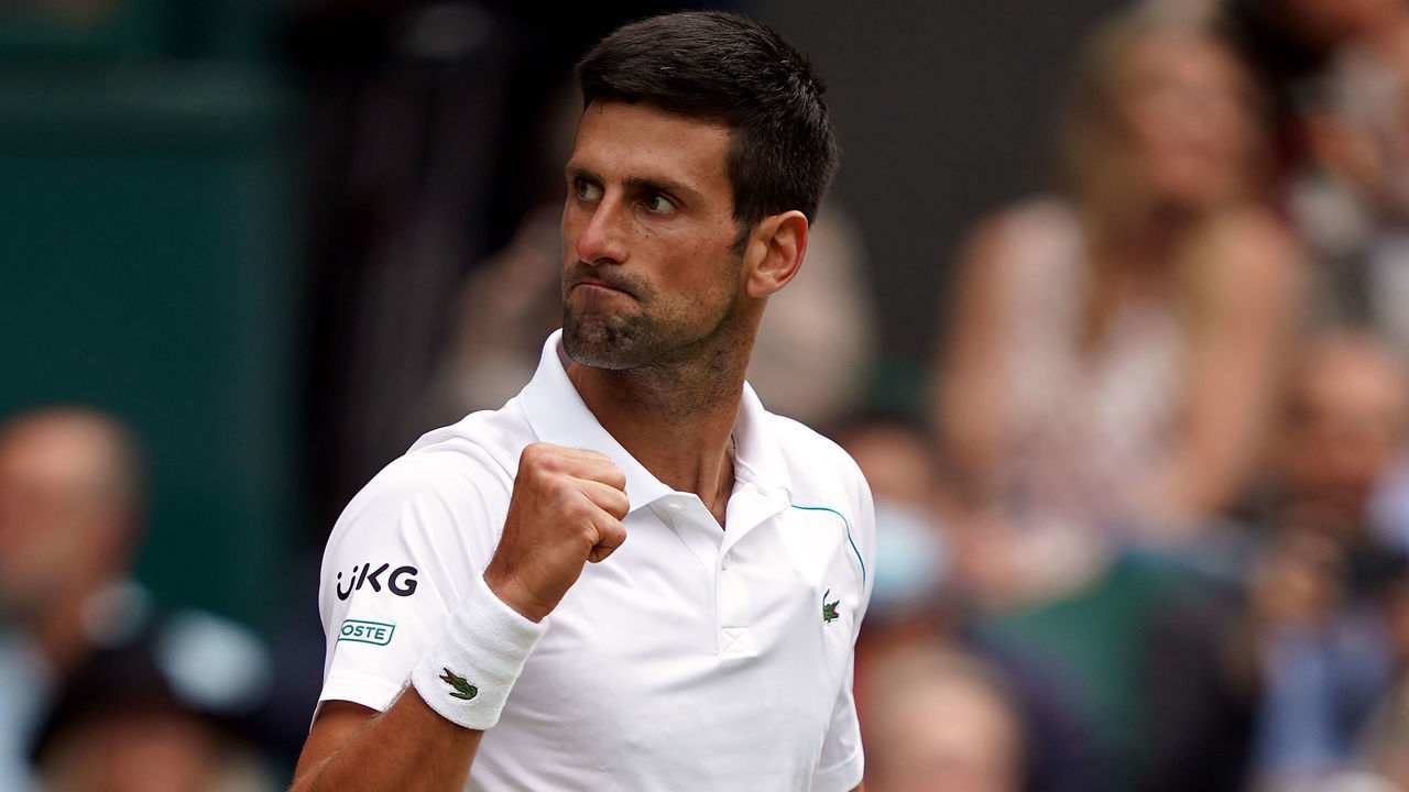 Novak Djokovic reacts during the Gentlemen's Singles final against Matteo Berrettini on day thirteen of Wimbledon at The All England Lawn Tennis and Croquet Club, Wimbledon. Picture date: Sunday July 11, 2021.