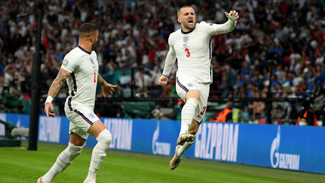 LONDON, ENGLAND - JULY 11: Luke Shaw of England celebrates after scoring their side's first goal during the UEFA Euro 2020 Championship Final between Italy and England at Wembley Stadium on July 11, 2021 in London, England.