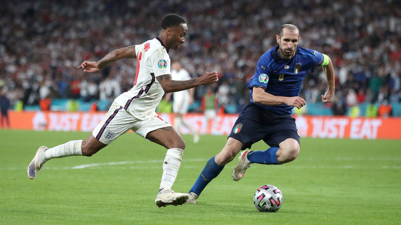 England's Raheem Sterling (left) and Italy's Giorgio Chiellini in action during the UEFA Euro 2020 Final at Wembley Stadium, London. Picture date: Sunday July 11, 2021.
