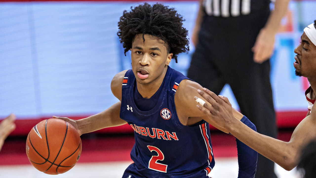 FAYETTEVILLE, ARKANSAS - JANUARY 20: Sharife Cooper #2 of the Auburn Tigers drives to the basket in the second half against the Arkansas Razorbacks at Bud Walton Arena on January 20, 2021 in Fayetteville, Arkansas. The Razorbacks defeated the Tigers 75-73.