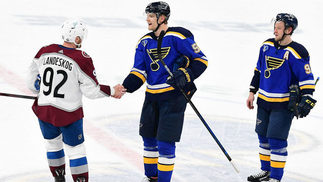 ST. LOUIS, MO - MAY 23: St. Louis Blues defenseman Colton Parayko (55) congratulates Colorado Avalanche left wing Gabriel Landeskog (92) after the fourth game of a first round Stanley Cup Playoff series between the Colorado Avalanche and the St. Louis Blues on May 23, 2021, at Enterprise Center, St. Louis, Mo. ,