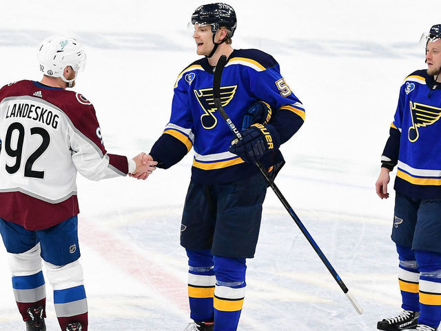 ST. LOUIS, MO - MAY 23: St. Louis Blues defenseman Colton Parayko (55) congratulates Colorado Avalanche left wing Gabriel Landeskog (92) after the fourth game of a first round Stanley Cup Playoff series between the Colorado Avalanche and the St. Louis Blues on May 23, 2021, at Enterprise Center, St. Louis, Mo. ,