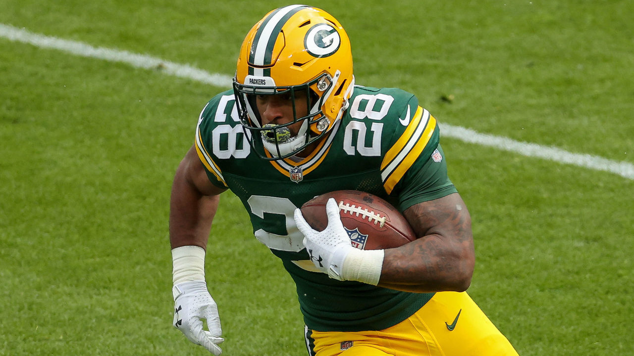 GREEN BAY, WISCONSIN - NOVEMBER 01: AJ Dillon #28 of the Green Bay Packers runs with the ball in the second quarter against the Minnesota Vikings at Lambeau Field on November 01, 2020 in Green Bay, Wisconsin.