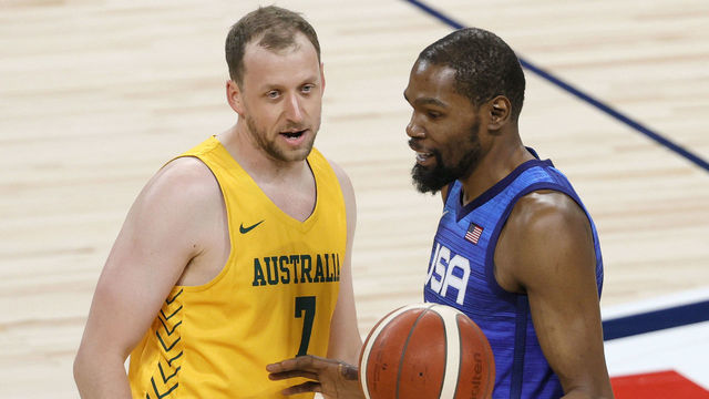LAS VEGAS, NEVADA - JULY 12: Joe Ingles #7 of the Australia Boomers talks with Kevin Durant #7 of the United States after Ingles fouled Durant during an exhibition game at Michelob Ultra Arena ahead of the Tokyo Olympic Games on July 12, 2021 in Las Vegas, Nevada. Australia defeated the United States 91-83.