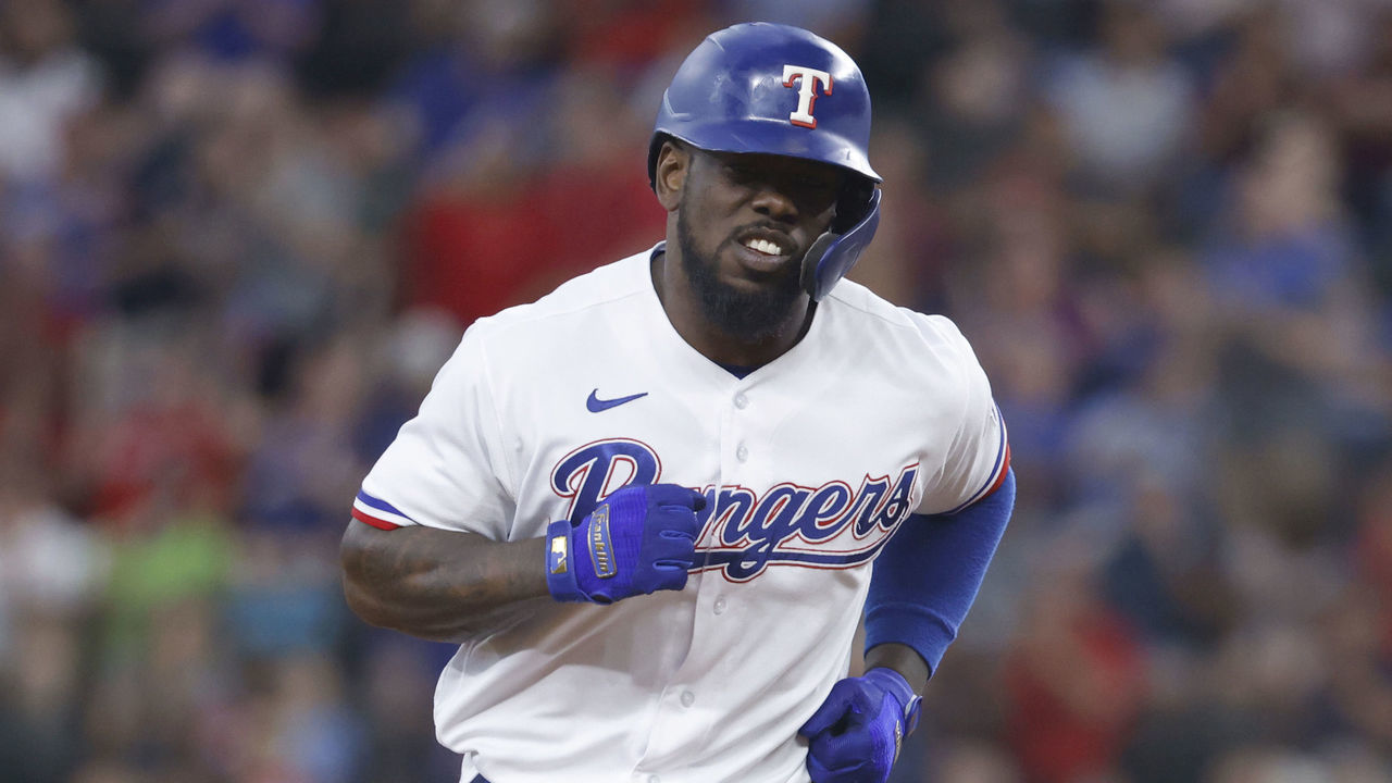 ARLINGTON, TX - JULY 10: Adolis Garcia #53 of the Texas Rangers runs the bases after hitting a solo home run against the Oakland Athletics at Globe Life Field on July 10, 2021 in Arlington, Texas.