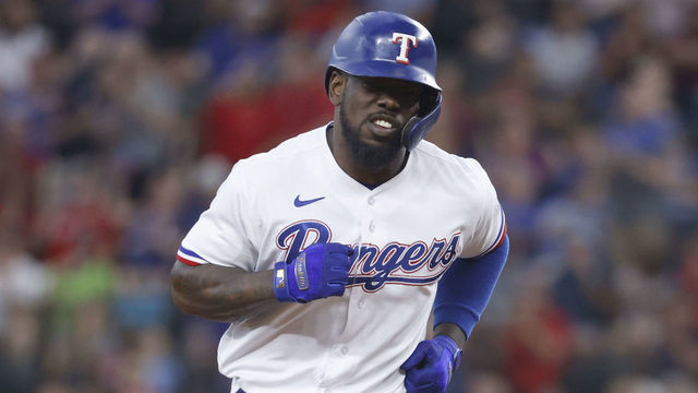 ARLINGTON, TX - JULY 10: Adolis Garcia #53 of the Texas Rangers runs the bases after hitting a solo home run against the Oakland Athletics at Globe Life Field on July 10, 2021 in Arlington, Texas.