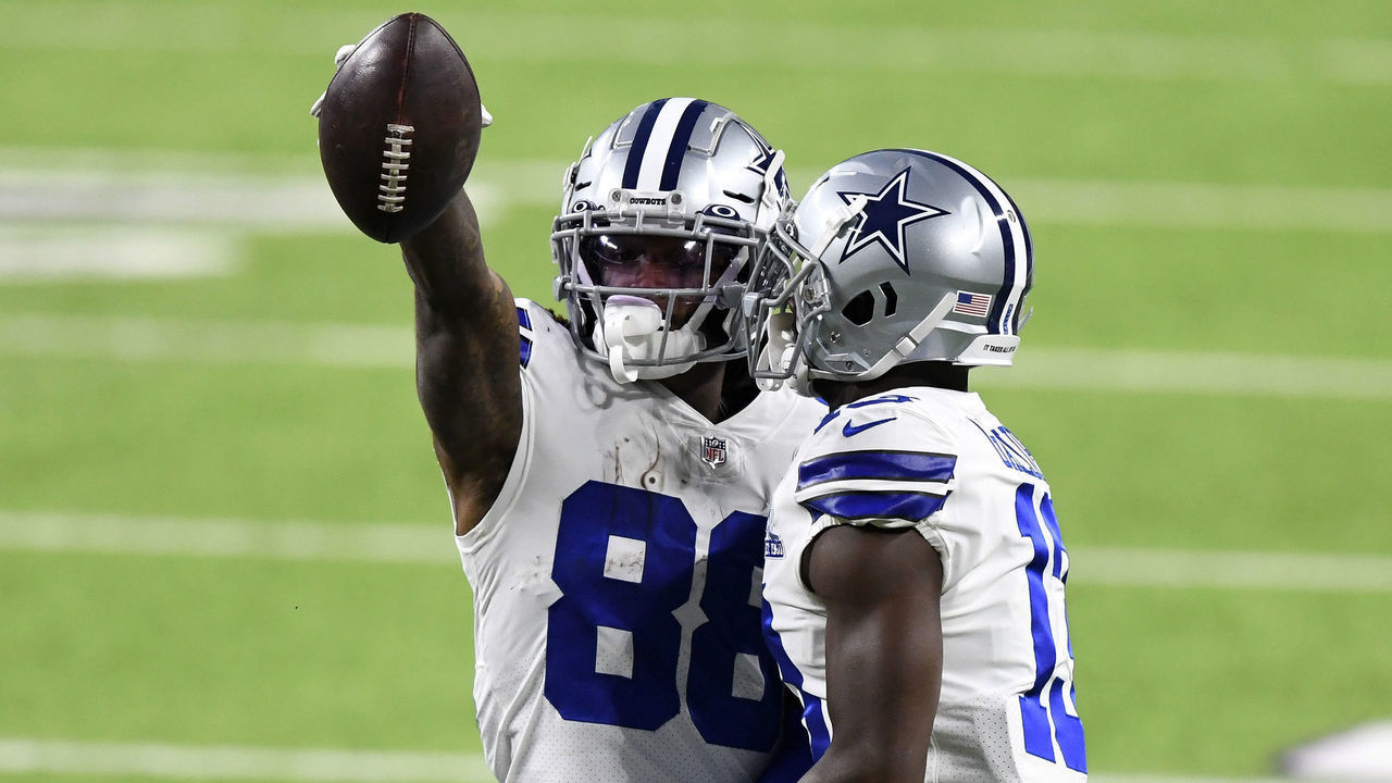 MINNEAPOLIS, MINNESOTA - NOVEMBER 22: CeeDee Lamb #88 of the Dallas Cowboys celebrates with teammate Michael Gallup #13 following a touchdown reception during their game against the Minnesota Vikings at U.S. Bank Stadium on November 22, 2020 in Minneapolis, Minnesota.
