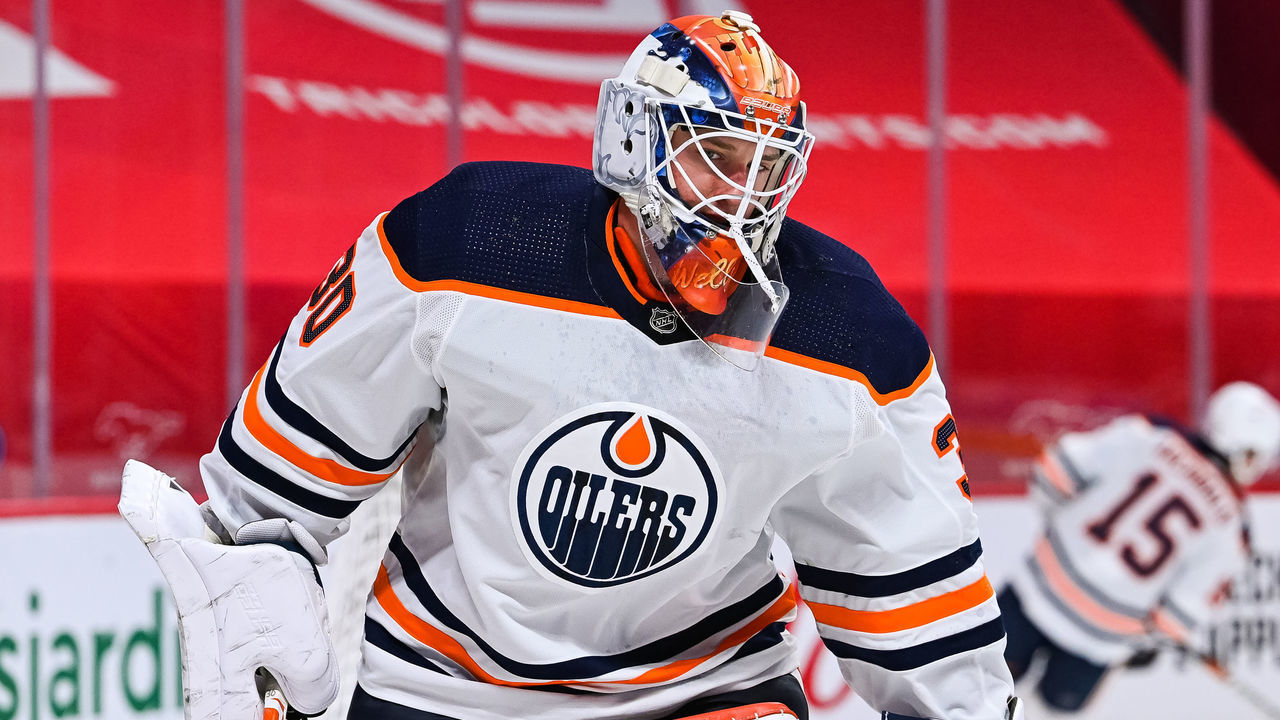 MONTREAL, QC - FEBRUARY 11: Look on Edmonton Oilers goalie Dylan Wells (30) at warm-up before the Edmonton Oilers versus the Montreal Canadiens game on February 11, 2021, at Bell Centre in Montreal, QC
