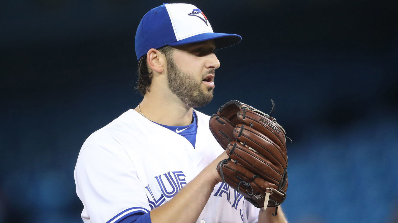 TORONTO, ON - MAY 15: Mike Bolsinger #49 of the Toronto Blue Jays looks in before delivering a pitch in the third inning during MLB game action against the Atlanta Braves at Rogers Centre on May 15, 2017 in Toronto, Canada.