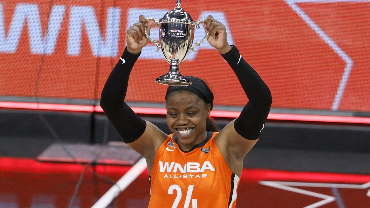 LAS VEGAS, NEVADA - JULY 14: Arike Ogunbowale #24 of Team WNBA holds up the MVP trophy after the 2021 WNBA All-Star Game at Michelob ULTRA Arena on July 14, 2021 in Las Vegas, Nevada. Team WNBA defeated the USA Women's National Team 93-85.
