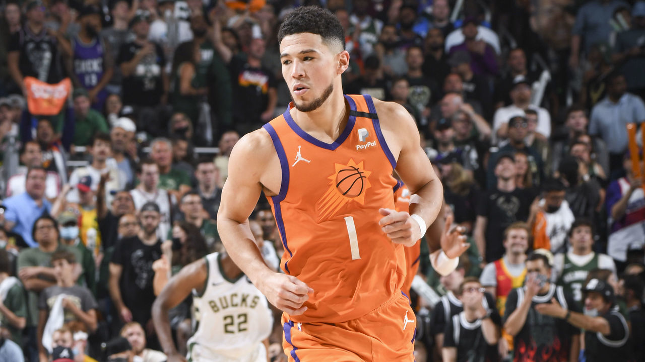 MILWAUKEE, WI - JULY 14: Devin Booker #1 of the Phoenix Suns runs down the court during the game against the Milwaukee Bucks during Game Four of the 2021 NBA Finals on July 14, 2021 at the Fiserv Forum Center in Milwaukee, Wisconsin. Mandatory Copyright Notice: Copyright 2021 NBAE .