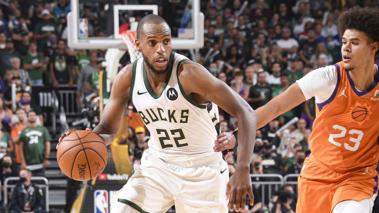 MILWAUKEE, WI - JULY 14: Khris Middleton #22 of the Milwaukee Bucks handles the ball during the game against the Phoenix Suns during Game Four of the 2021 NBA Finals on July 14, 2021 at the Fiserv Forum Center in Milwaukee, Wisconsin. Mandatory Copyright Notice: Copyright 2021 NBAE .