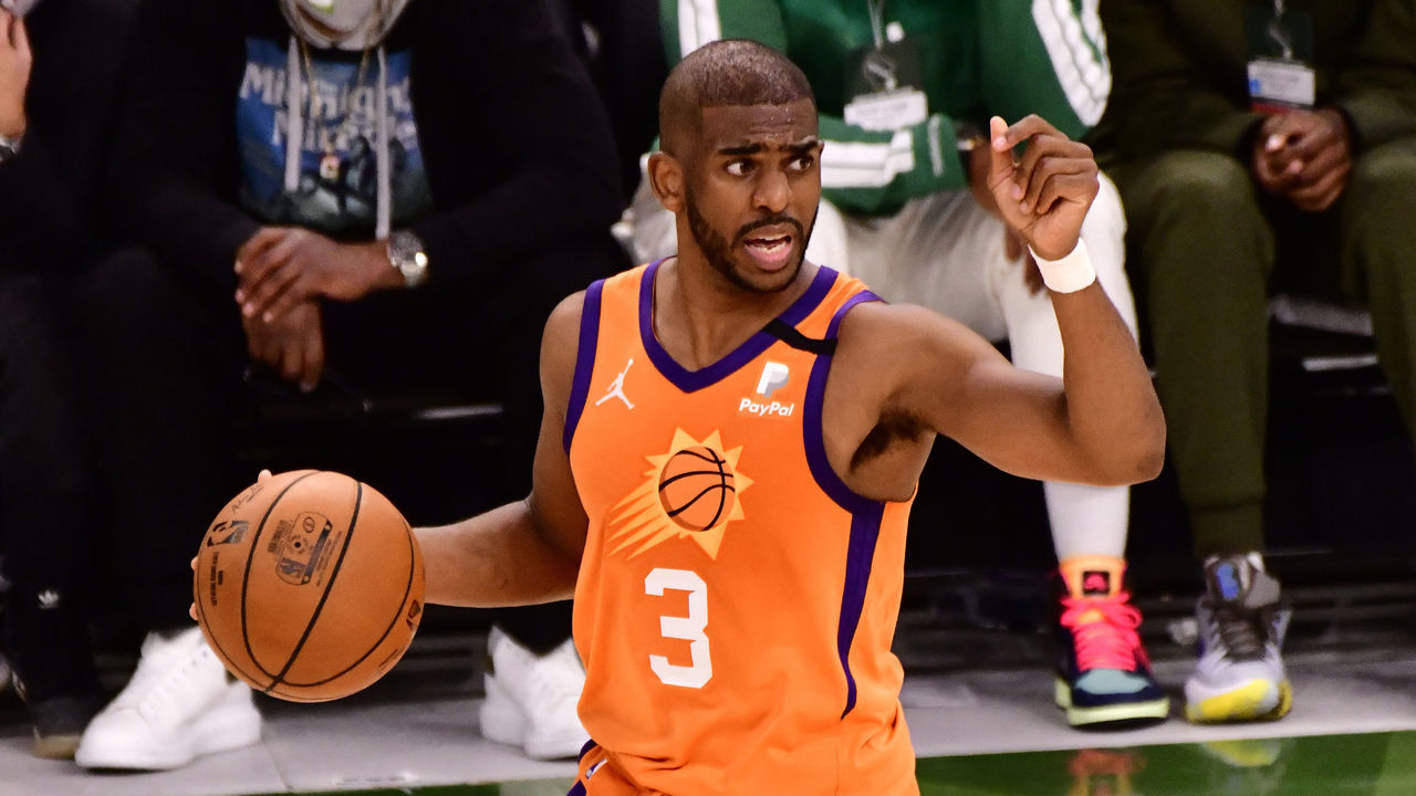 MILWAUKEE, WI - JULY 14: Chris Paul #3 of the Phoenix Suns handles the ball during the game against the Milwaukee Bucks during Game Four of the 2021 NBA Finals on July 14, 2021 at the Fiserv Forum Center in Milwaukee, Wisconsin. Mandatory Copyright Notice: Copyright 2021 NBAE .