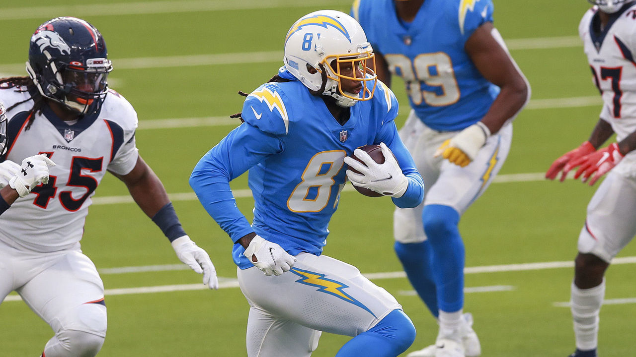 INGLEWOOD, CALIFORNIA - DECEMBER 27: Mike Williams #81 of the Los Angeles Chargers carries the ball during the second quarter against the Denver Broncos at SoFi Stadium on December 27, 2020 in Inglewood, California.