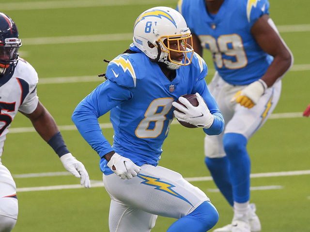 INGLEWOOD, CALIFORNIA - DECEMBER 27: Mike Williams #81 of the Los Angeles Chargers carries the ball during the second quarter against the Denver Broncos at SoFi Stadium on December 27, 2020 in Inglewood, California.