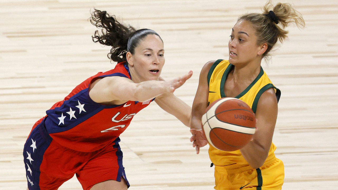 LAS VEGAS, NEVADA - JULY 16: Leilani Mitchell #5 of the Australia Opals passes against Sue Bird #6 of the United States during an exhibition game at Michelob ULTRA Arena ahead of the Tokyo Olympic Games on July 16, 2021 in Las Vegas, Nevada. Australia defeated the United States 70-67.