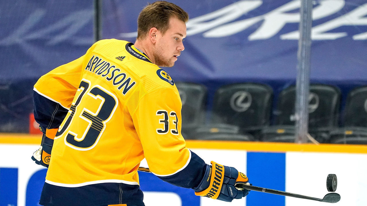 NASHVILLE, TN - APRIL 13: Viktor Arvidsson #33 of the Nashville Predators skates in warm-ups prior to the game against the Tampa Bay Lightning at Bridgestone Arena on April 13, 2021 in Nashville, Tennessee.